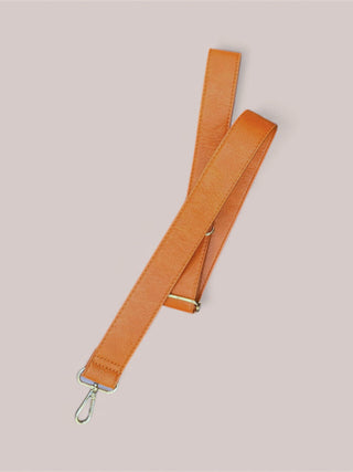 Pair of Brown leather straps with gold hardware that match the brown Mini Mae